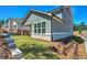 Landscaped backyard with a covered patio and ample green space, offering a serene outdoor retreat at 724 Fairlane Dr, Marietta, GA 30064