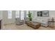 Inviting living room with modern furnishings, hardwood floors, large windows, and stylish decor at 724 Fairlane Dr, Marietta, GA 30064