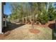 Well-maintained backyard with mature trees and manicured shrubbery at 3087 Mountain Shadow Way, Marietta, GA 30064