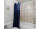 Cozy bathroom features a tub, shower, and tiled walls at 3087 Mountain Shadow Way, Marietta, GA 30064