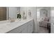 Bathroom featuring a double sink vanity and tiled shower at 3087 Mountain Shadow Way, Marietta, GA 30064
