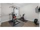 Well-equipped exercise room with weight machines, stationary bike, and television at 3087 Mountain Shadow Way, Marietta, GA 30064