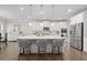 Bright kitchen with white cabinets, a large center island, and stainless steel appliances at 3087 Mountain Shadow Way, Marietta, GA 30064