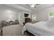 Spacious bedroom featuring trey ceilings, carpet floors, and large windows for natural light at 3087 Mountain Shadow Way, Marietta, GA 30064