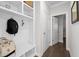 Functional mud room with built-in storage, bench seating, and coat hooks at 3087 Mountain Shadow Way, Marietta, GA 30064
