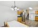 Charming dining room features wood floors, neutral walls, and convenient access to kitchen at 3980 Carlton Cove Ct, Loganville, GA 30052