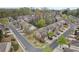 Overhead shot of residential area showcasing a mix of architectural styles and lush trees at 1680 Fair Oak Way # 24, Mableton, GA 30126