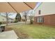 Serene backyard with a patio, ideal for outdoor dining and relaxation at 1680 Fair Oak Way # 24, Mableton, GA 30126