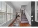 Inviting foyer with hardwood floors, staircase, and abundant natural light at 1680 Fair Oak Way # 24, Mableton, GA 30126