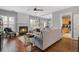 Cozy living room with a fireplace, hardwood floors, and comfortable seating at 1680 Fair Oak Way # 24, Mableton, GA 30126