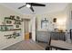 Charming Bedroom features unique wall shelving and neutral decor at 2230 Mcbrayer Ct, Cumming, GA 30028