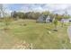Beautiful house with a sprawling front yard, mature trees, and a long driveway at 3068 Turning Creek Trail, Dacula, GA 30019