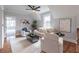 Comfortable upstairs living room with wood floors, vaulted ceilings, natural light, and neutral tones at 3068 Turning Creek Trail, Dacula, GA 30019
