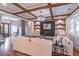 Spacious living room showcasing coffered ceilings, hardwood floors, and stylish decor at 3068 Turning Creek Trail, Dacula, GA 30019