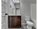 Bathroom featuring a vanity sink and a toilet and bathtub with neutral paint and grey flooring at 4463 Grove Lake St, Loganville, GA 30052