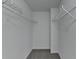 Walk-in closet with wire shelving at 4463 Grove Lake St, Loganville, GA 30052