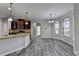 Bright kitchen featuring hardwood floors and natural light at 4463 Grove Lake St, Loganville, GA 30052