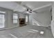 Comfortable living room with fireplace at 4463 Grove Lake St, Loganville, GA 30052