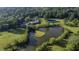 A birds eye view of the golf course and surrounding areas at 80 La Rue Nw Pl, Atlanta, GA 30327