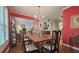 Dining room with hardwood floors, chandelier, and access to the living room at 80 La Rue Nw Pl, Atlanta, GA 30327