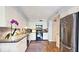 Bright kitchen featuring white cabinets, granite countertops, and stainless steel appliances at 80 La Rue Nw Pl, Atlanta, GA 30327