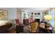 Inviting living room with hardwood floors, a fireplace, built-in bookshelves, and stylish furnishings at 80 La Rue Nw Pl, Atlanta, GA 30327