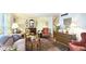 Well-decorated living room with hardwood floors, vintage furniture, and an area rug at 80 La Rue Nw Pl, Atlanta, GA 30327