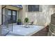 Cozy outdoor patio with table and chairs, perfect for relaxing and enjoying the surroundings at 80 La Rue Nw Pl, Atlanta, GA 30327
