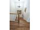 Staircase showcasing hardwood steps and white risers leading down to a lower level at 80 La Rue Nw Pl, Atlanta, GA 30327