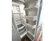 The kitchen is bright and spacious, offering an open view of a pristine, empty refrigerator at 1864 Drew Cir, Austell, GA 30168