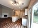 Inviting open layout seamlessly connects the living room, kitchen island, and outdoor access at 1864 Drew Cir, Austell, GA 30168