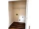 Small laundry room with hardwood floors at 1864 Drew Cir, Austell, GA 30168