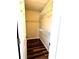 Walk-in closet with wood-look floors and shelving at 1864 Drew Cir, Austell, GA 30168
