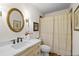 Cozy bathroom featuring a vanity with a marble countertop and shower with curtain at 4340 Hadaway Nw Rd, Kennesaw, GA 30152