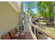 Exterior view of deck stairs leading down to the backyard, with bench seating and a play area at 4340 Hadaway Nw Rd, Kennesaw, GA 30152