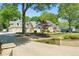 Beautiful home with a long driveway, mature landscaping, and a well-manicured front yard at 4340 Hadaway Nw Rd, Kennesaw, GA 30152