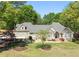 Beautiful home featuring an arched entry, bay window and manicured front lawn at 4340 Hadaway Nw Rd, Kennesaw, GA 30152