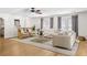 Open living space with hardwood floors, bright windows and comfortable seating at 4340 Hadaway Nw Rd, Kennesaw, GA 30152