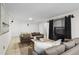 Inviting living room with cozy sofas, decorative pillows, and modern entertainment setup for relaxation and enjoyment at 4340 Hadaway Nw Rd, Kennesaw, GA 30152