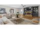 Bright and spacious living room featuring a fireplace and built-in shelving at 4340 Hadaway Nw Rd, Kennesaw, GA 30152