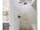 Elegant bathroom shower with marble tiling and modern fixtures offering a spa-like experience at 4340 Hadaway Nw Rd, Kennesaw, GA 30152