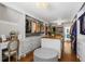 Spacious walk-in closet with custom shelving, storage island, vanity, and stylish light fixture at 4340 Hadaway Nw Rd, Kennesaw, GA 30152