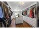 Large walk-in closet with a central island and custom shelving, providing ample storage space at 4340 Hadaway Nw Rd, Kennesaw, GA 30152
