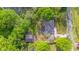 Aerial view of home with trees and surrounding landscape at 1150 Tinsley Nw Dr, Conyers, GA 30012