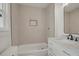 Updated bathroom with marble countertops, built in shower nook, and tiled shower at 1150 Tinsley Nw Dr, Conyers, GA 30012