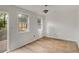 Unfinished bedroom with natural light from two windows and a door at 1150 Tinsley Nw Dr, Conyers, GA 30012