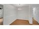 Dining room showcasing wood-look floors, white walls, and decorative lighting at 1150 Tinsley Nw Dr, Conyers, GA 30012