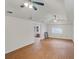 Living area features ceiling fans, wood-look floors, and a view of the backyard at 1150 Tinsley Nw Dr, Conyers, GA 30012