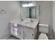 Bathroom with double sink vanity, classic fixtures and ample storage at 130 Fairview Dr, Stockbridge, GA 30281