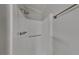 Bathroom features a shower with updated fixtures and neutral decor at 130 Fairview Dr, Stockbridge, GA 30281